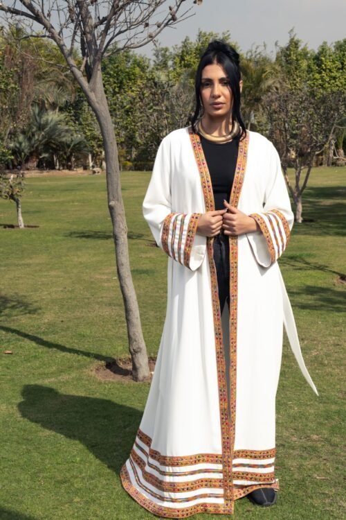 Classy Crepe Kimono Abaya, features a unique blend of traditional Abaya design and modern kimono style. The intricate detailing along the edges adds a touch of elegance, making it perfect for both casual and formal occasions
