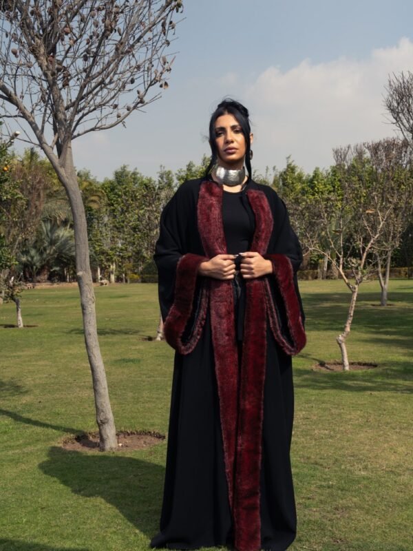 Black crepe kaftan with burgundy fur details on the sleeves and front for a bold and luxurious touch. - Image 4
